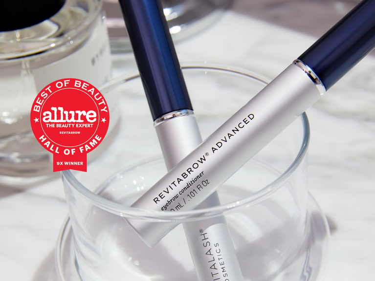 Image of 2 RevitaBrow Advanced tubes in a clear beaker. Also displayed is an Allure award seal for Best of Beauty Hall of Fame 9x Winner
